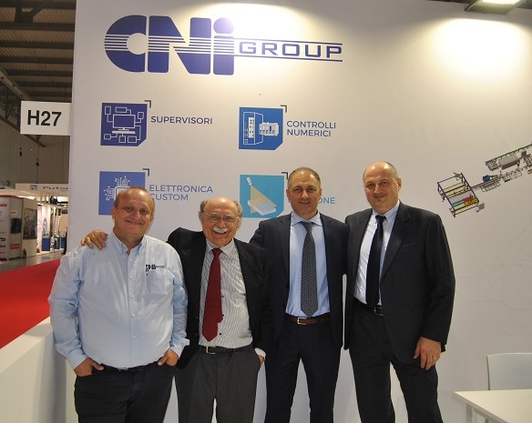 From left, Sandro Fabbri/Sales Engineer, Eng. Ezio Pasini/General Manager, Sandro Ciccone/Sales Manager and Stefano Sintoni/ Software Development. Photo Datalignum